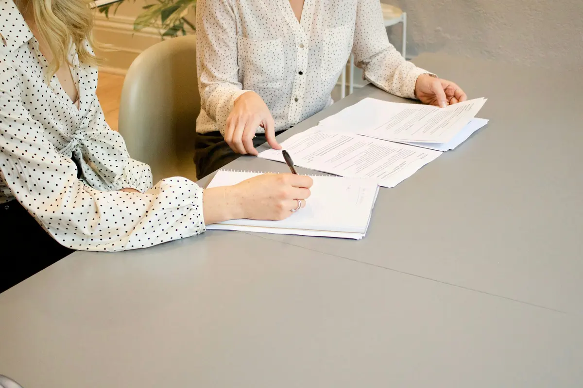 Signing the papers