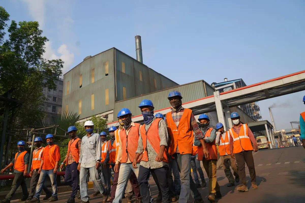 A shift arriving at the plant