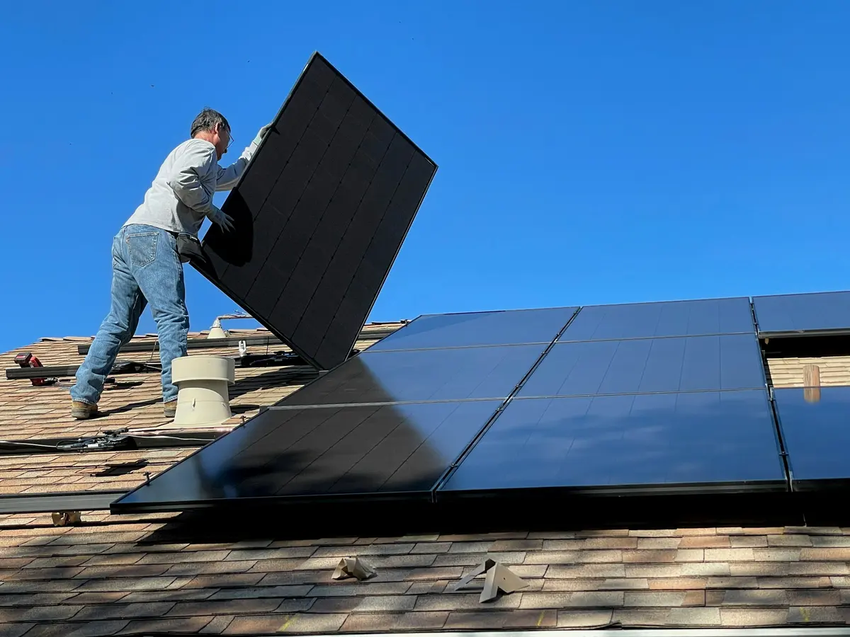 Fitting panels on a roof