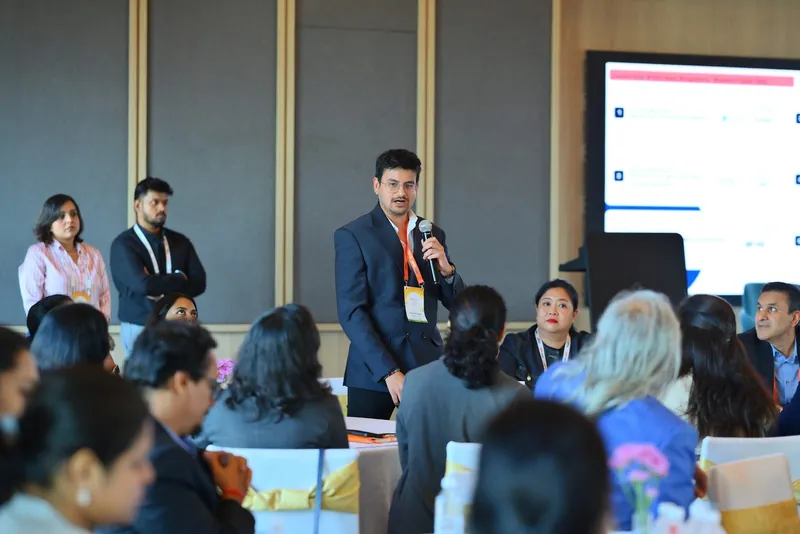 Eashan Gupta talking a room of mobility leaders through describing their own agents, Bengaluru